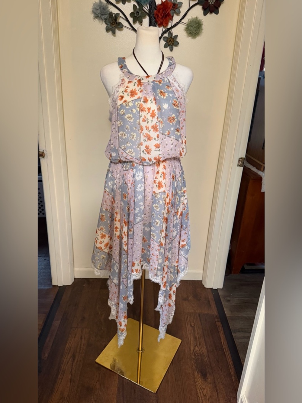 POL Floral Print halter dress with handkerchief hem Size small great for layerin
